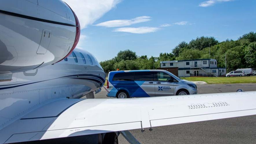 Prestwick Aviation Services Terminal, viewed over jet wing