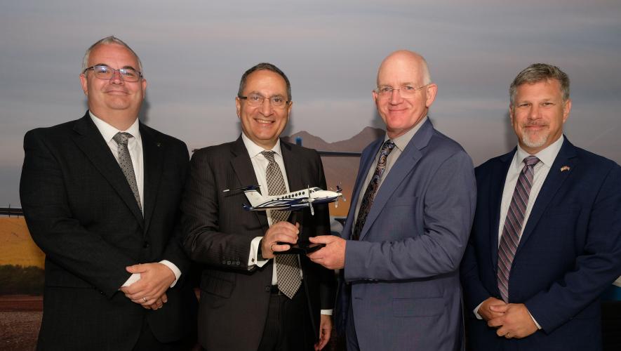 Gama Aviation group CEO Marwan Khalek (left center) and Bob Scott, Textron Aviation's special missions sales (right center)