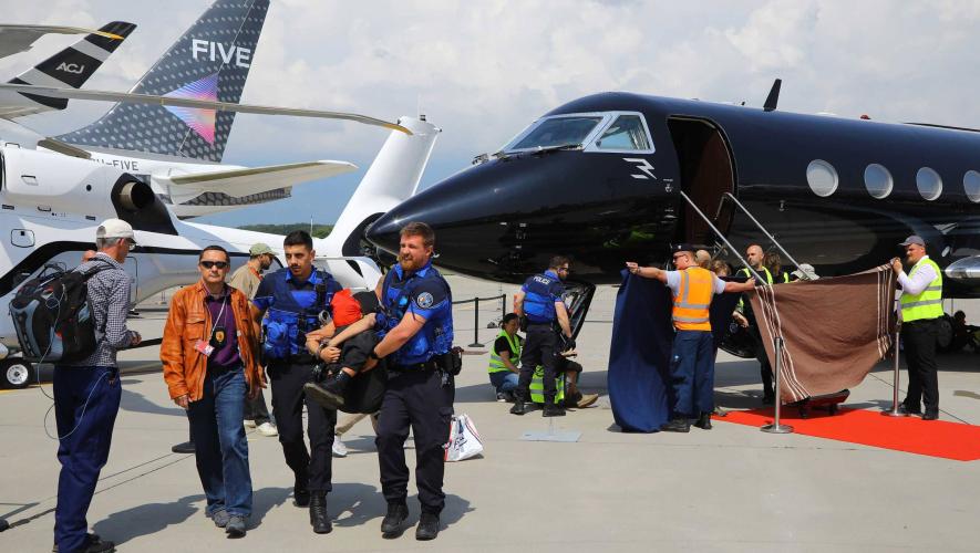 Protesters at EBACE 2023