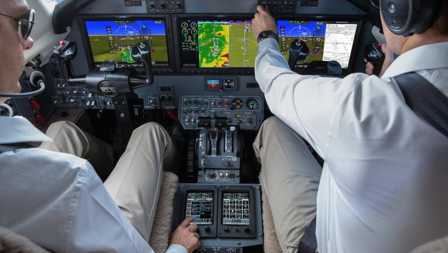 Garmin flight deck with two pilots